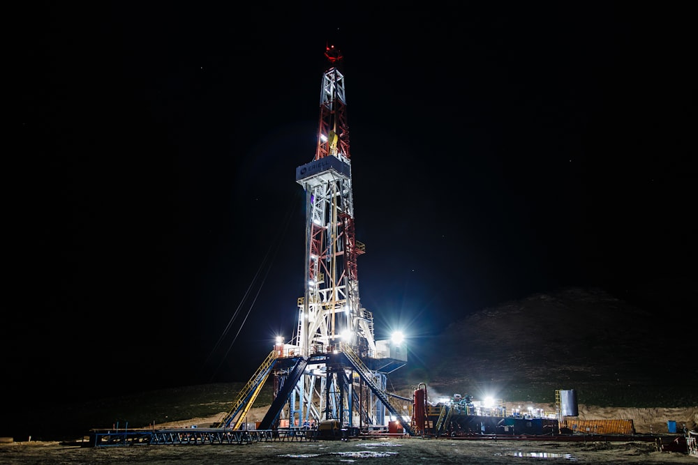 red and white tower during nighttime