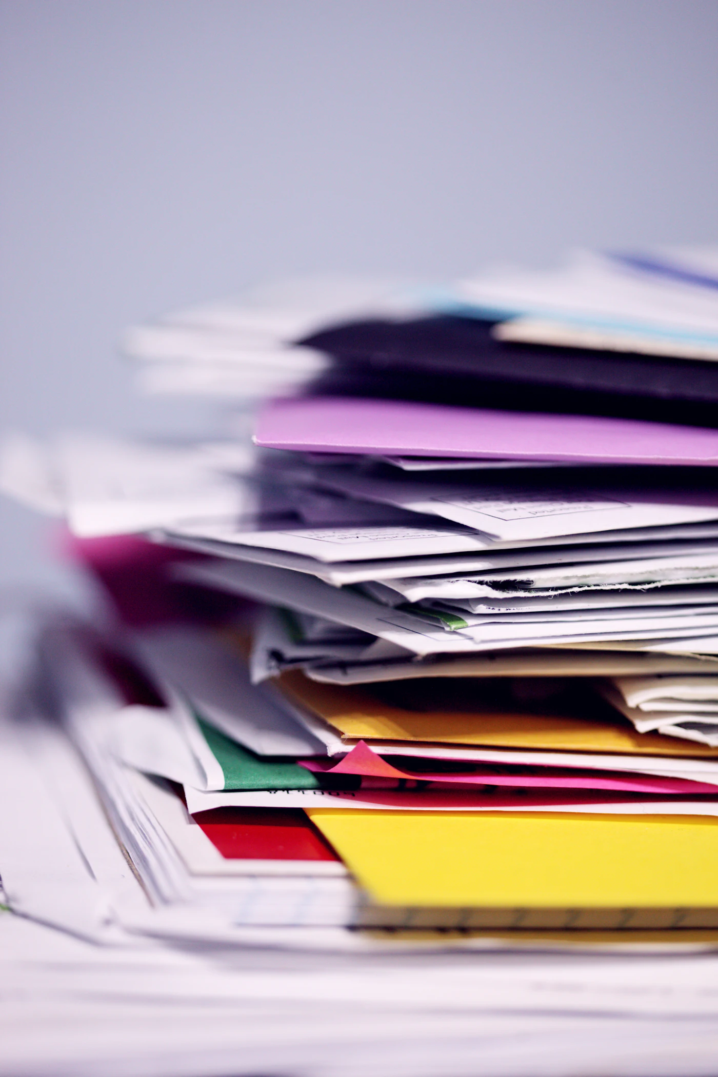 Organized folders and business paperwork on an office desk