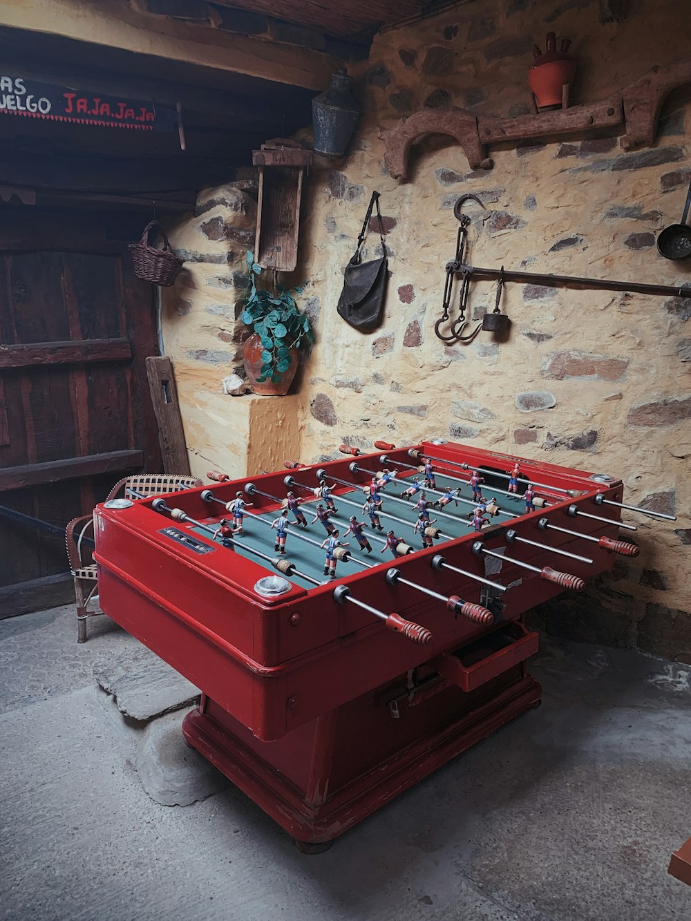red foosball table