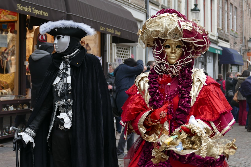 man and woman wearing costumes