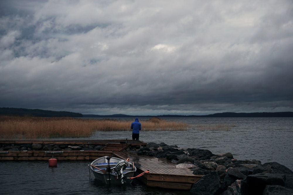 gray boat in body of water