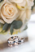 silver-colored wedding bands