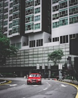 An urban vehicle cruising through a vibrant city street.