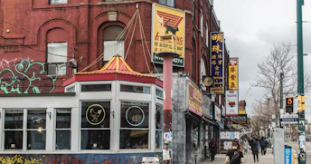 A collage of storefronts representing different service locations in various neighborhoods.