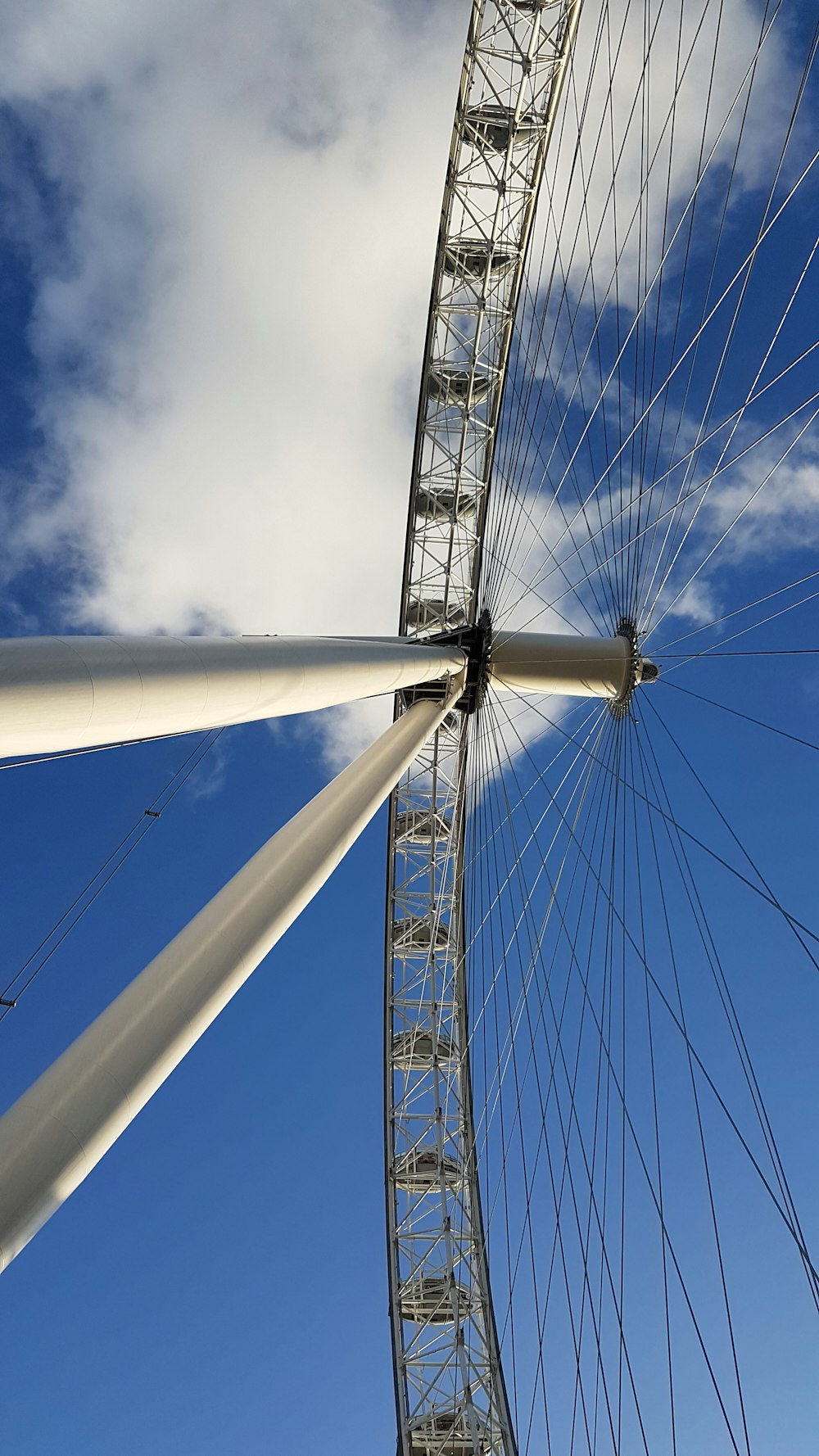 low-angle photography of white ferris-wheel