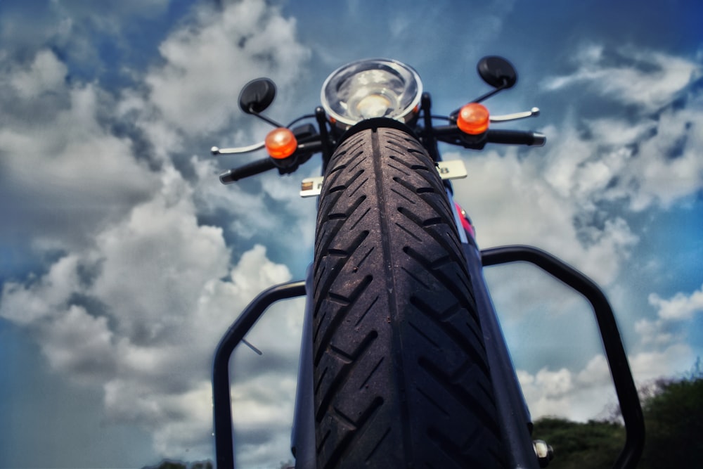 parked black motorcycle during day