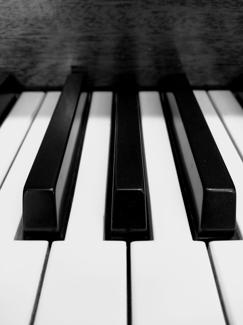 shallow focus photo of piano keys