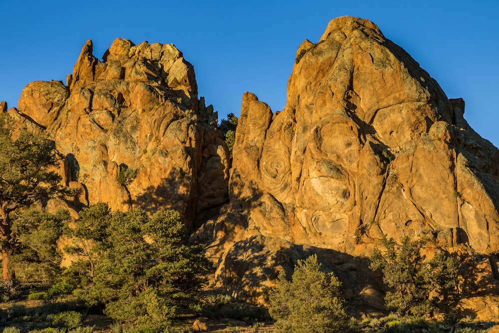 mountain range under clear blue sky