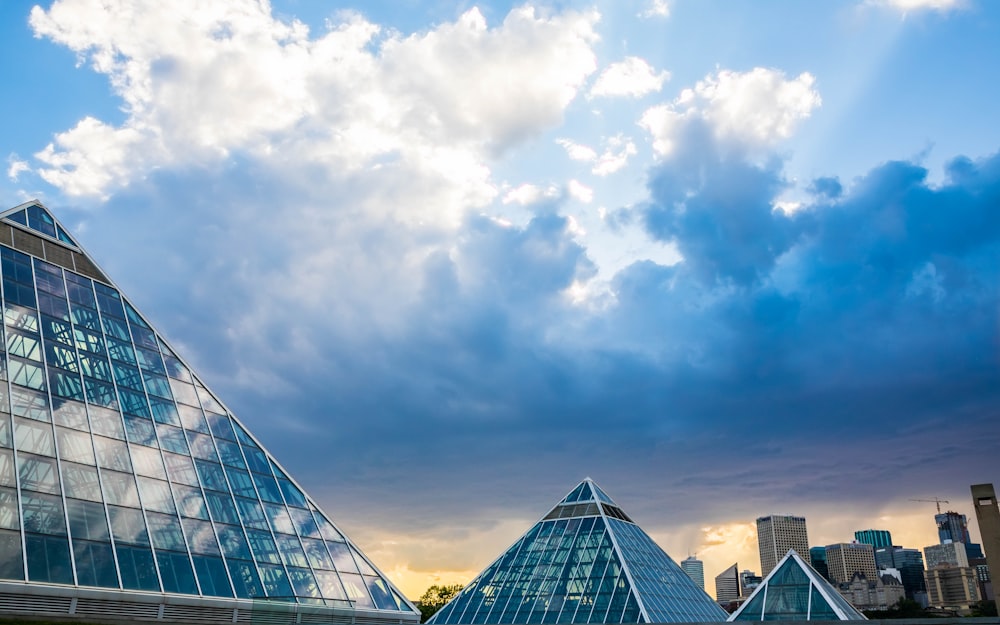 building under white clouds