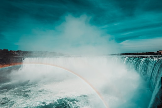 rainbow over water