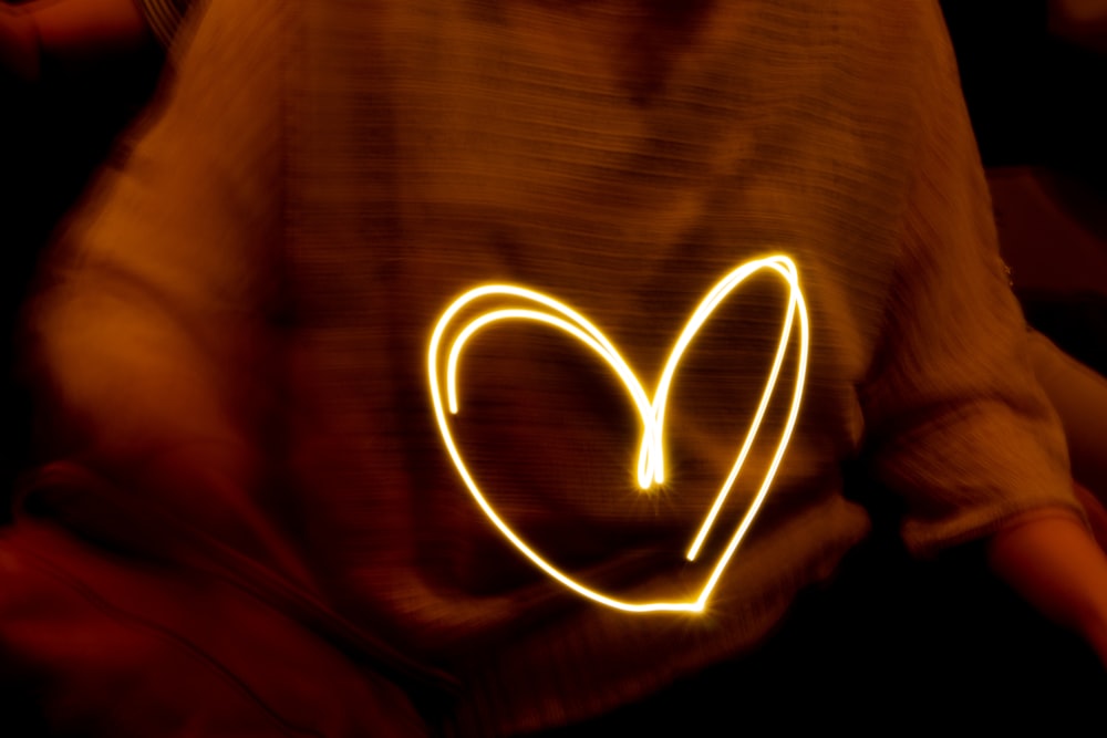 yellow heart neon light