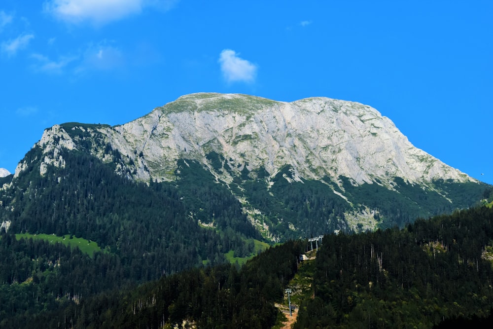 brown mountain under blue sky