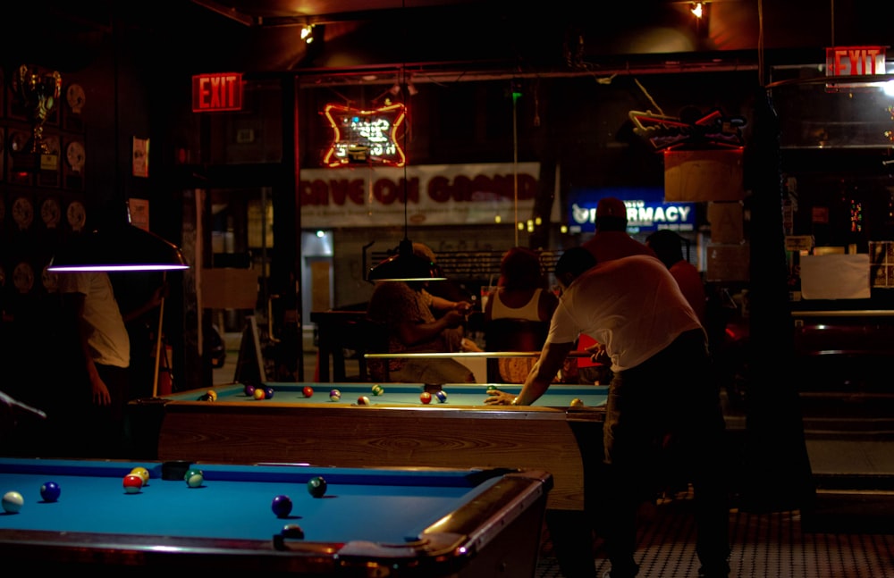 person playing billiard