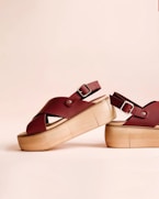 pair of maroon wedges