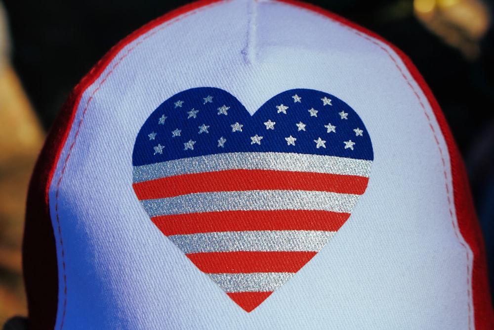 a hat with an american flag heart on it