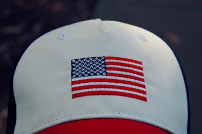 white, red, and blue fitted cap