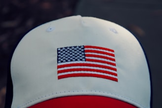 white, red, and blue fitted cap