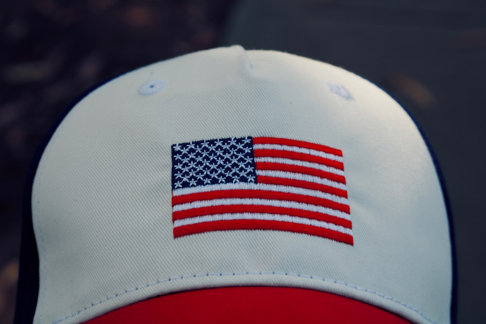 white, red, and blue fitted cap