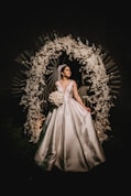 woman wearing white wedding gown
