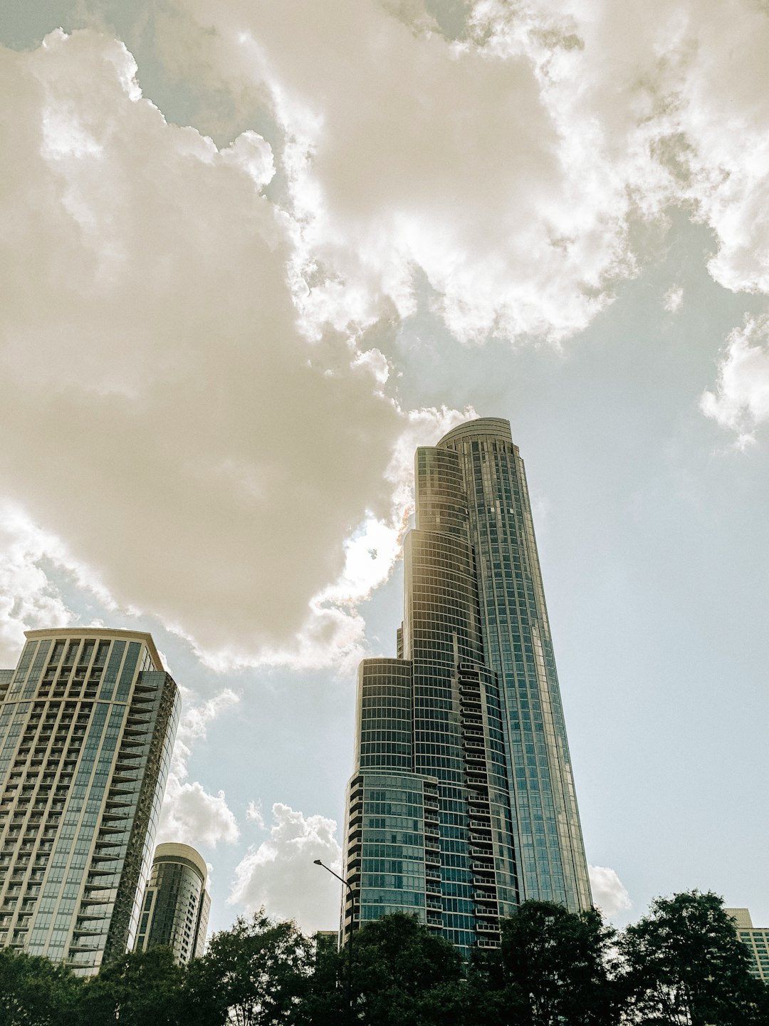 gray concrete building under white clouds