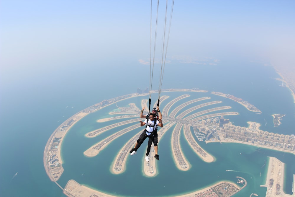 two people skydiving over Dubai