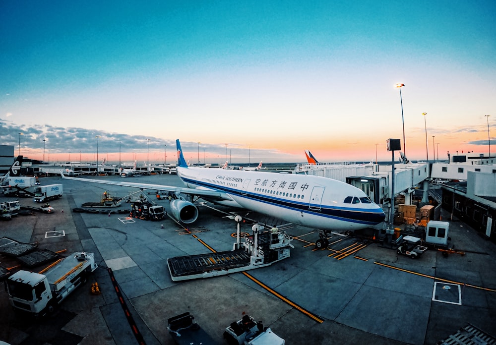 white and blue airplane