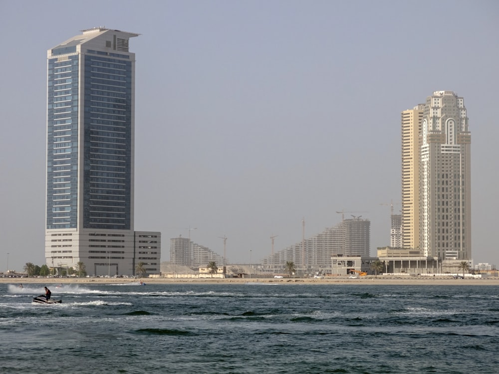 two brown and blue high-rise buildings