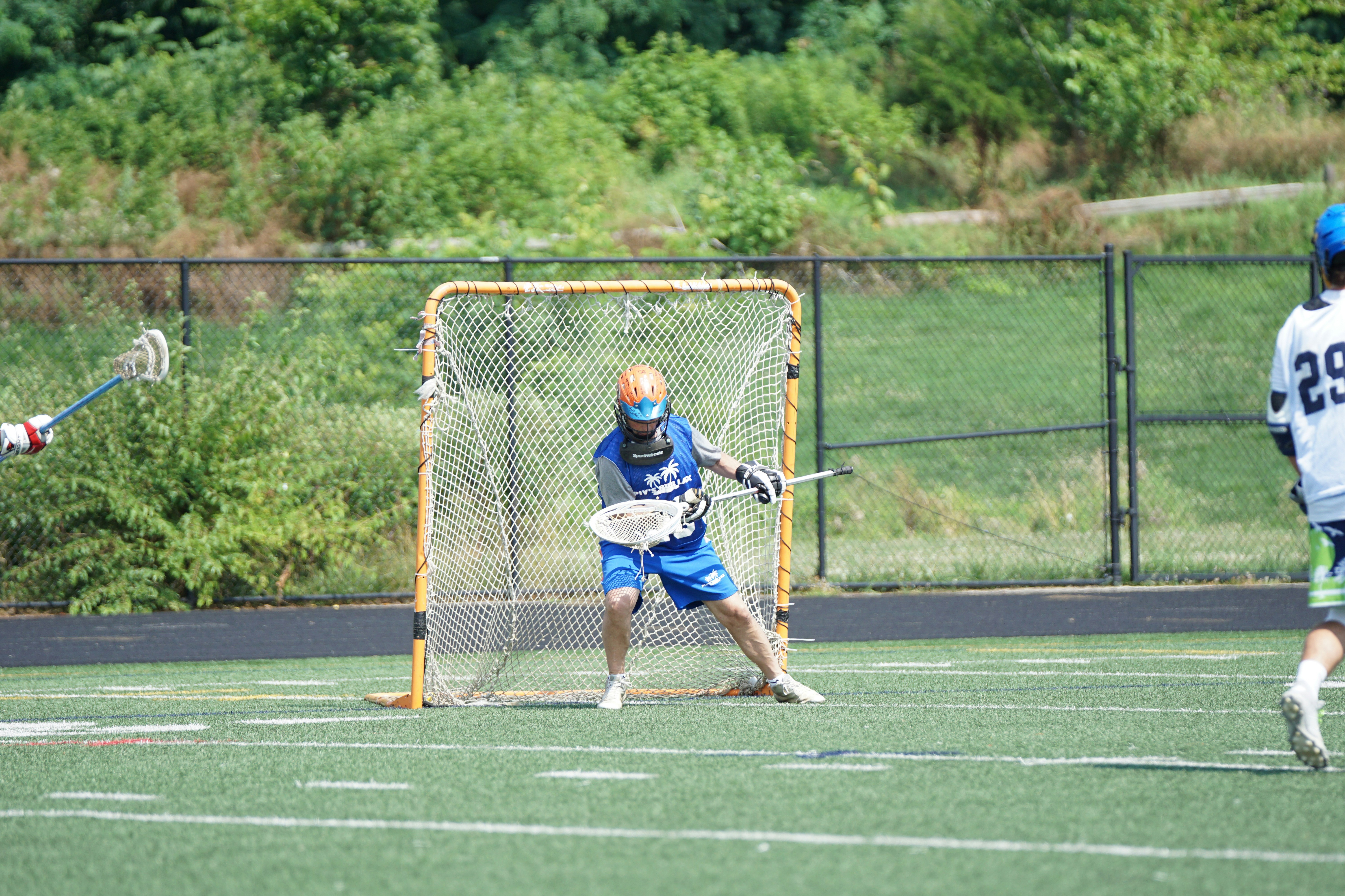 men playing lacrosse photo Free Human Image on Unsplash
