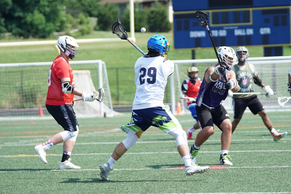 people playing on grass field