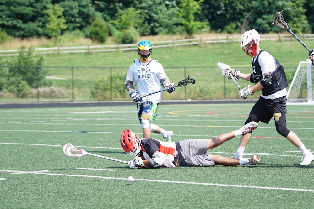 men playing lacrosse