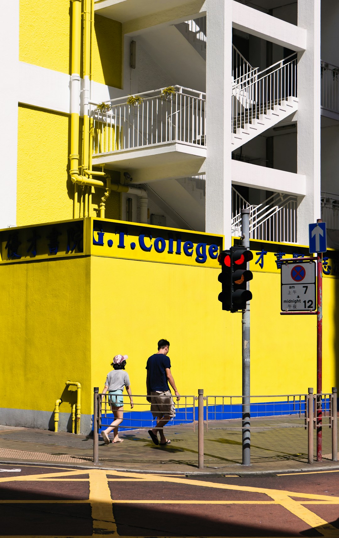 yellow and blue GT College building