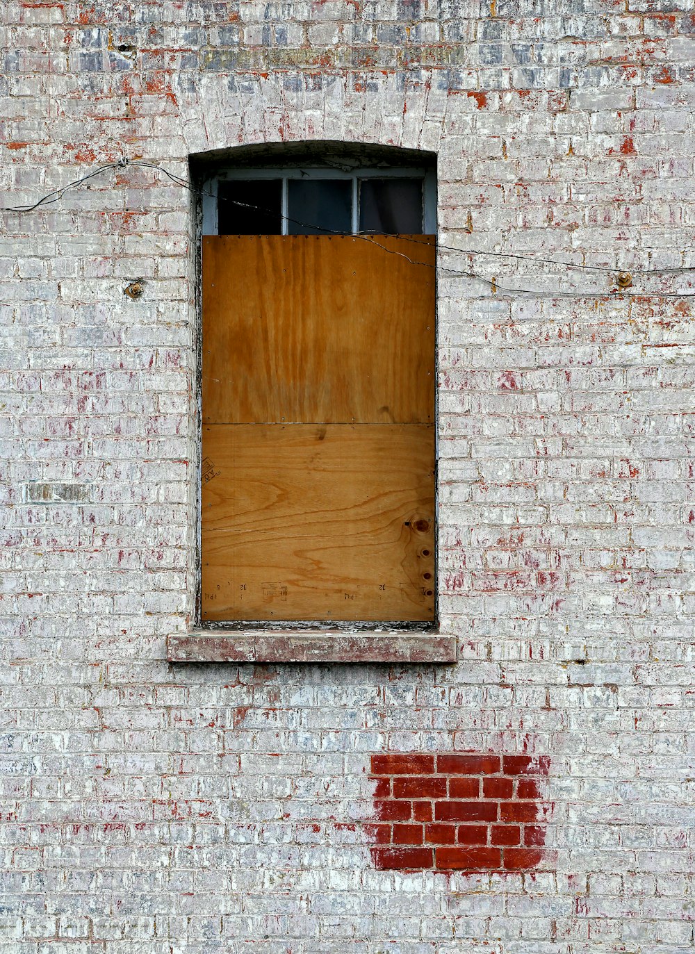 closed brown wooden window