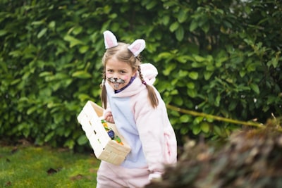 girl in pink hoodie easter bunny teams background