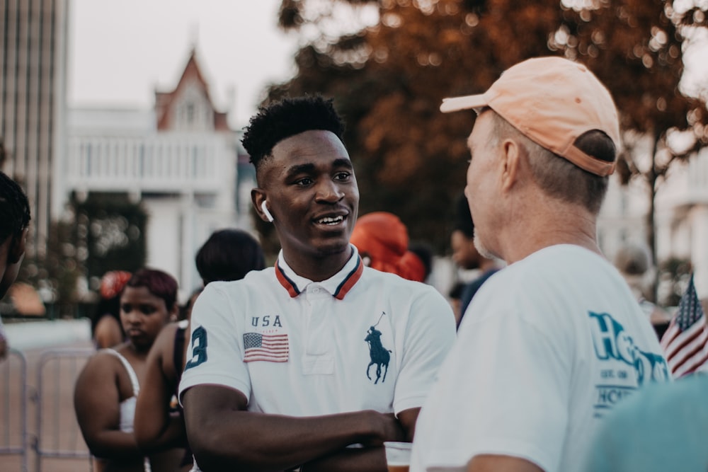 man in white US Polo Assn. collared top