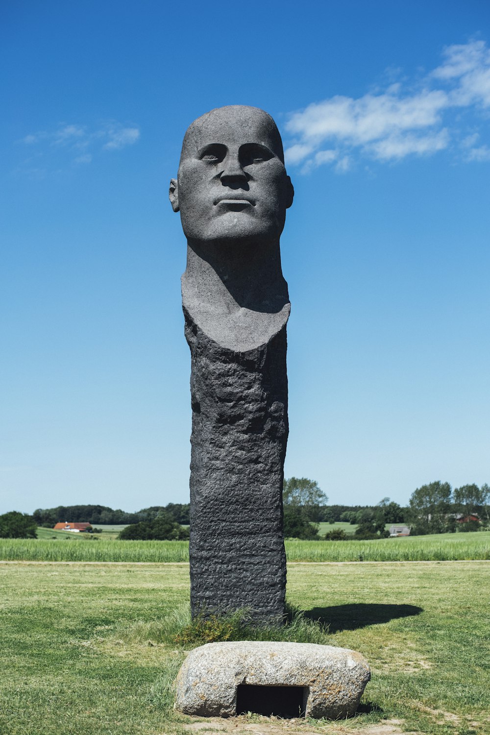 statue on grass field