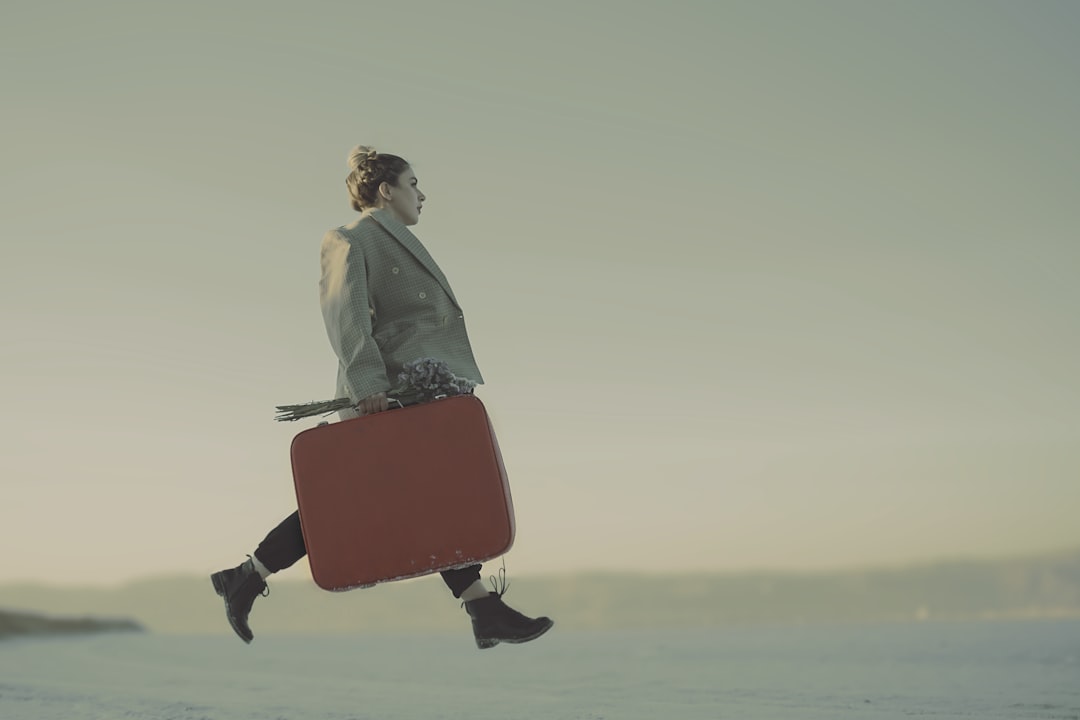 person carrying luggage,