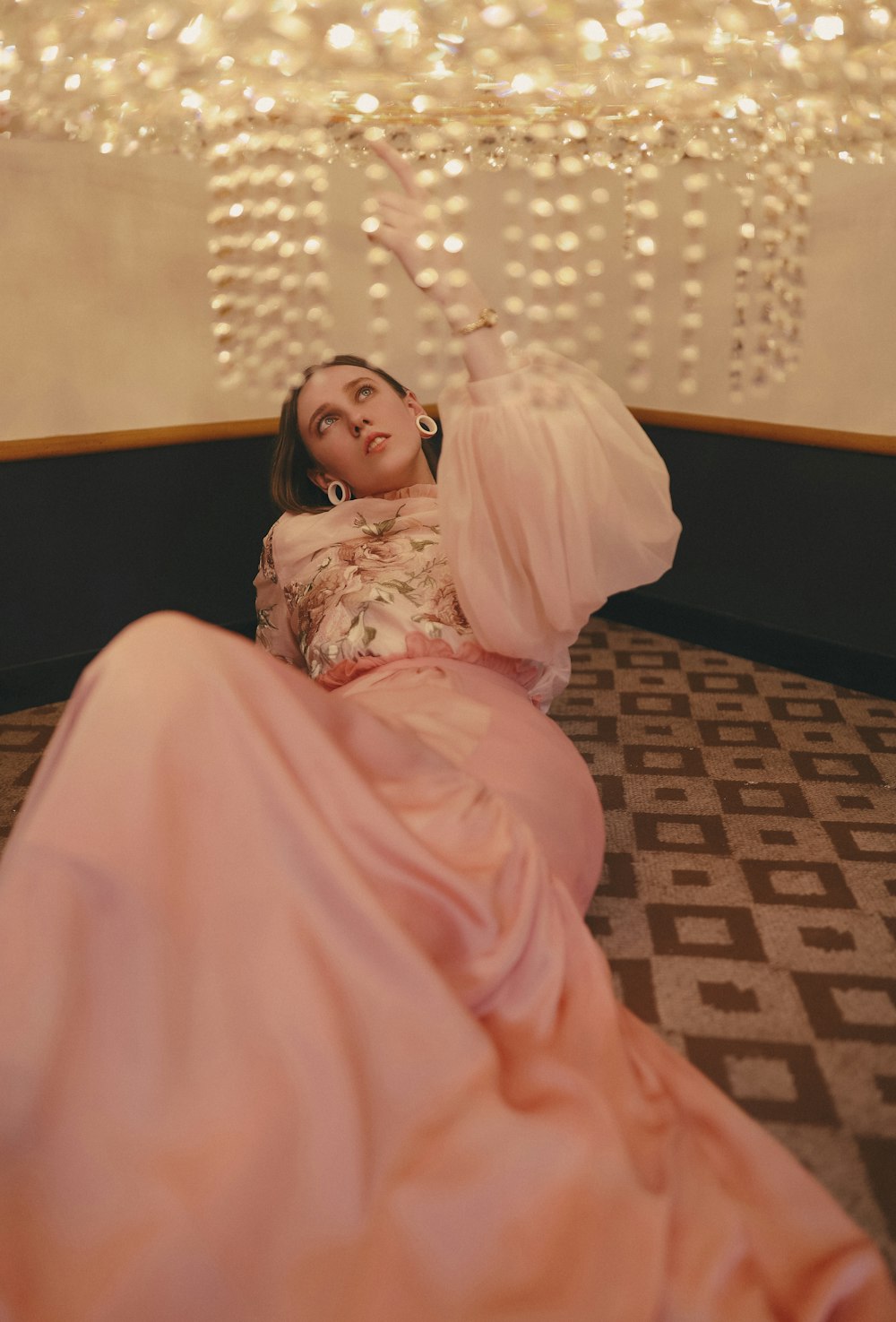 woman wearing pink floral dress