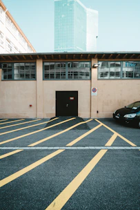 A sleek modern black and beige lot sign marking a prime land parcel.