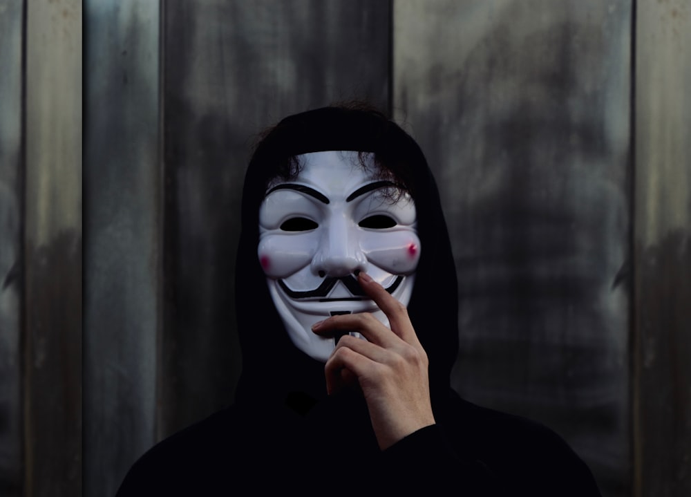 person wearing Guy Fawkes mask photo – Free Image on Unsplash