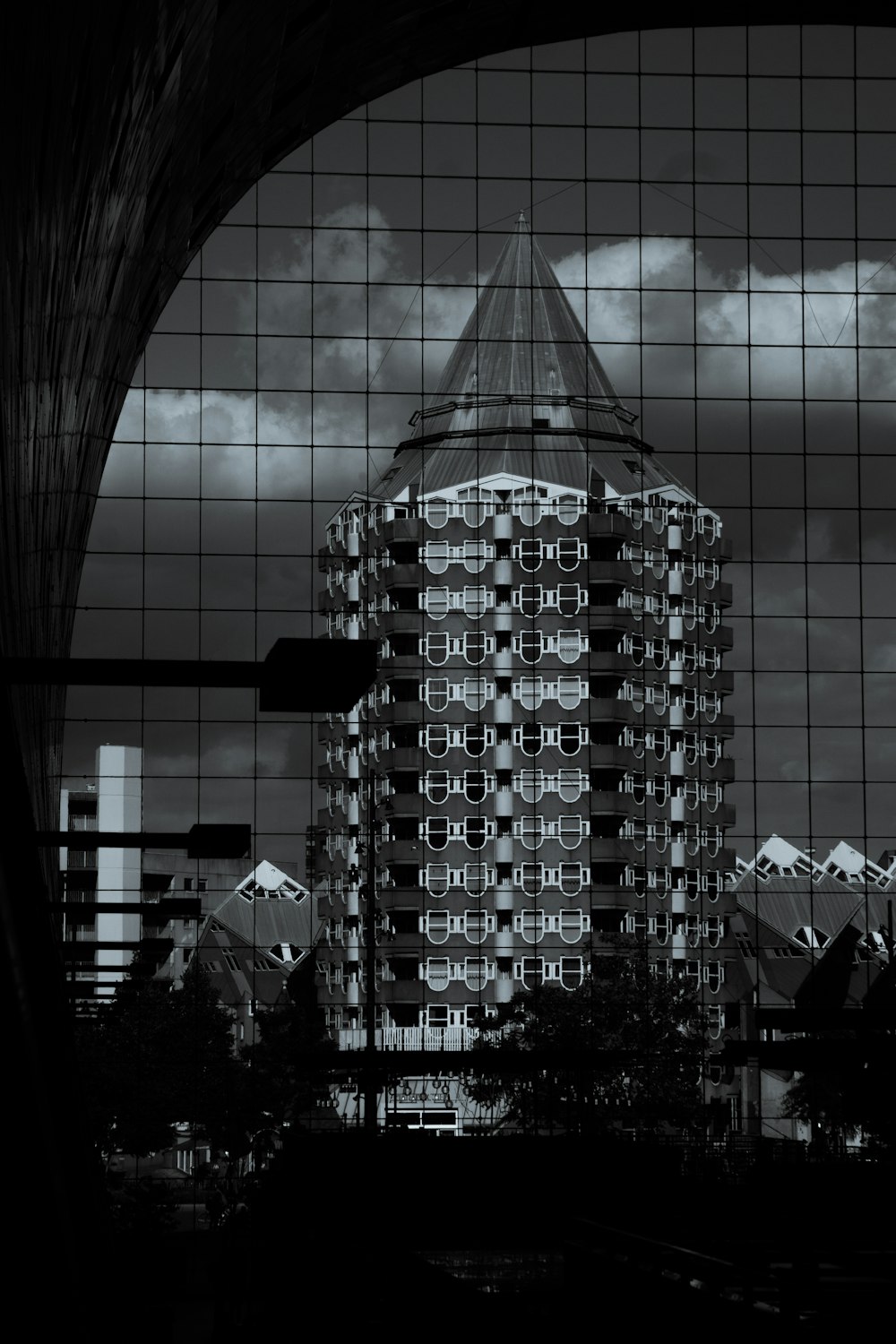 grayscale photo of glass building