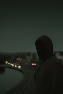 person wearing white hoodie