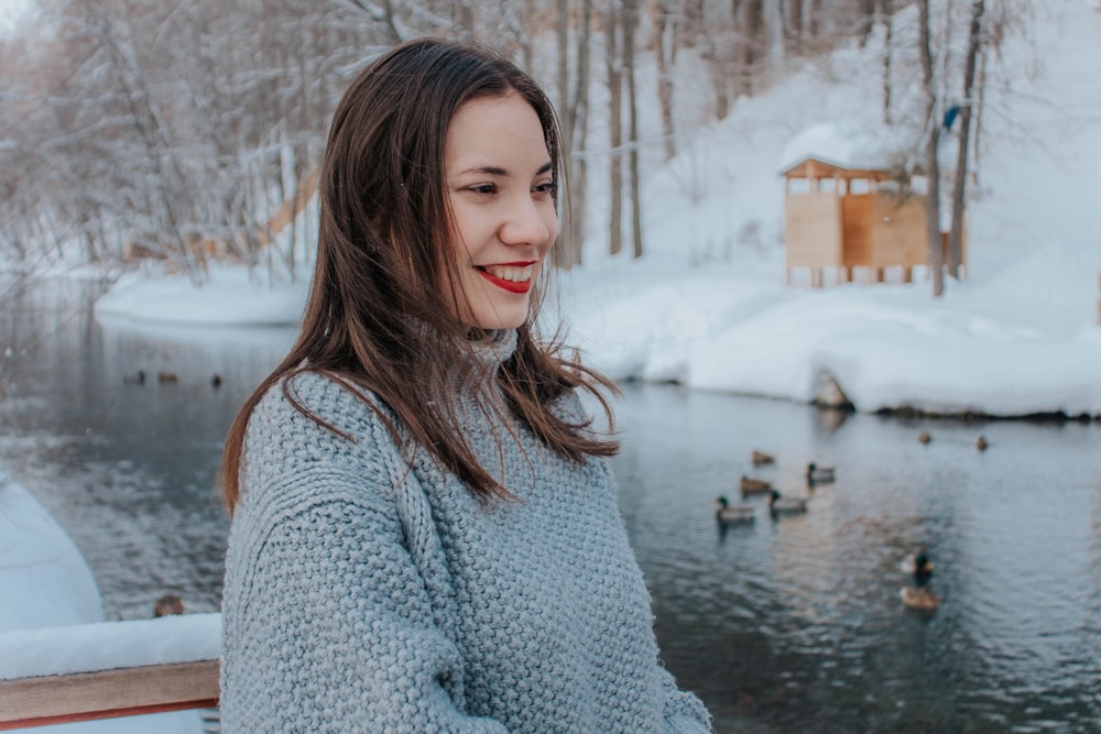 woman in gray sweater