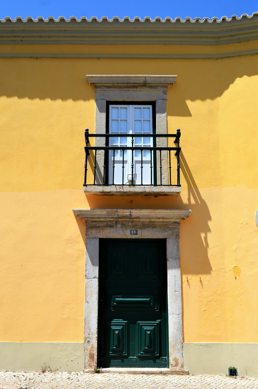 yellow concrete house