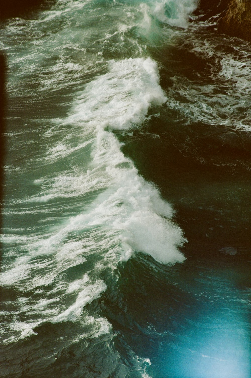 aerial view of crashing waves