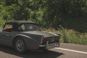 A vintage convertible car on a sunny day.