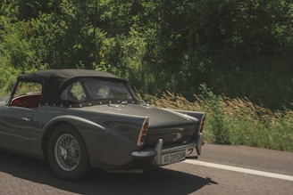 A vintage convertible car on a sunny day.
