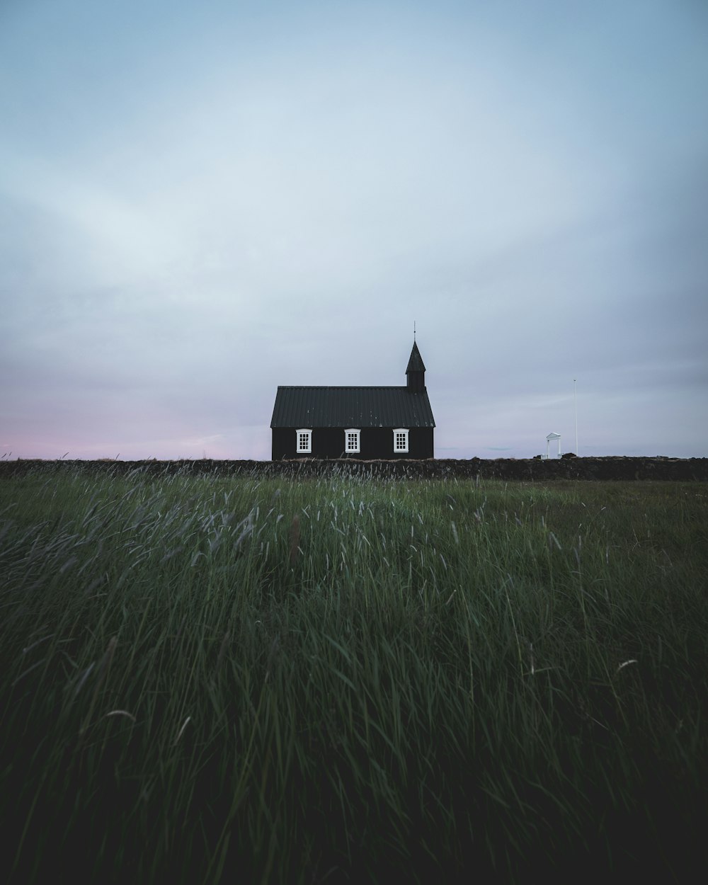 black cathedral on green grass