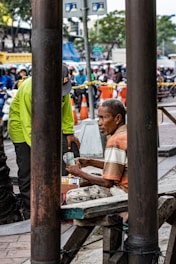 A customer receiving cash for second-hand goods.