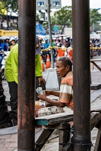 A customer receiving cash for second-hand goods.