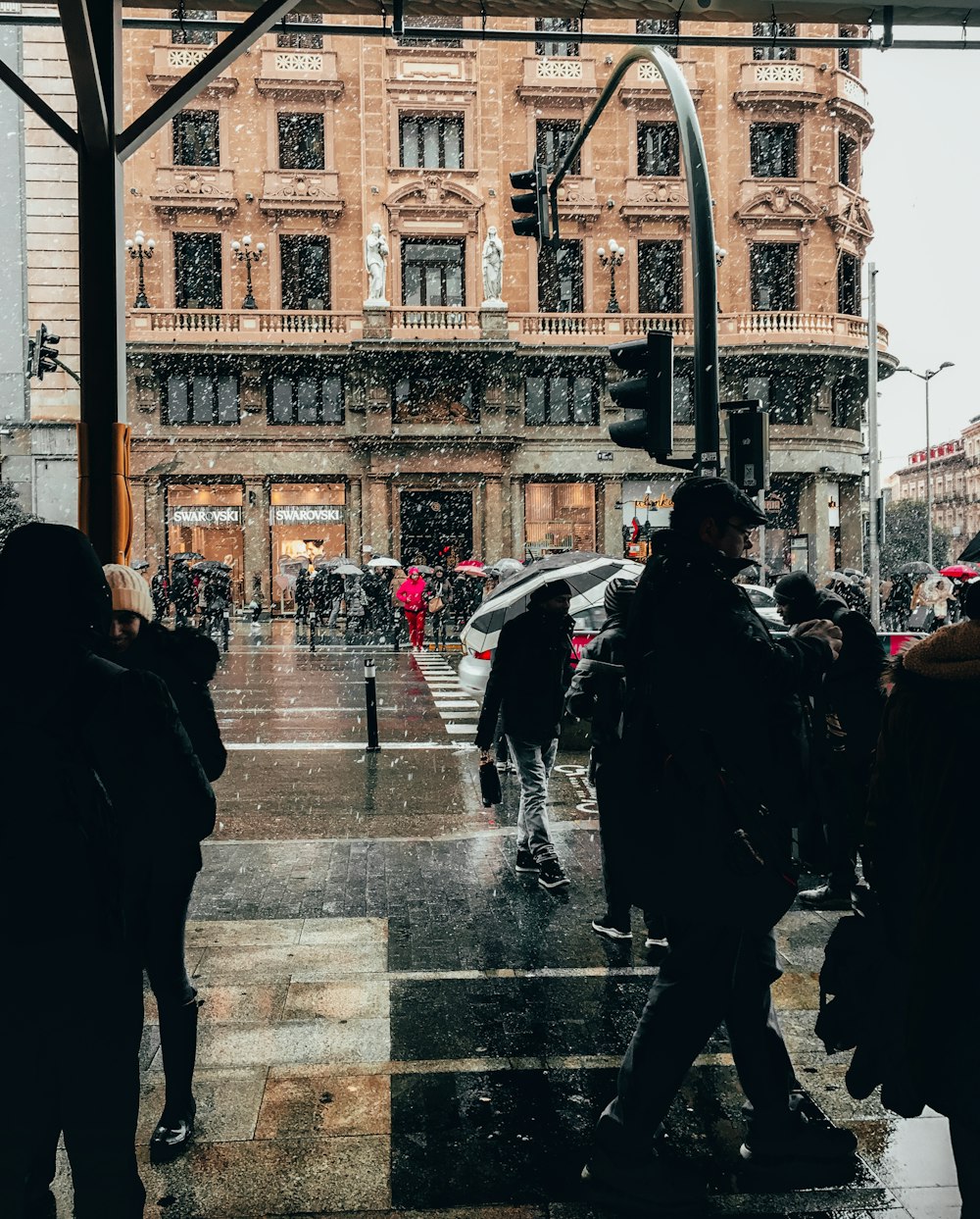 people walking on sidewalk during daytime